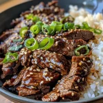Close-up view of juicy Korean Beef Bulgogi served on a plate.