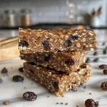 Close-up view of No-Bake Workout Bars with chocolate chips and oats.