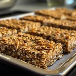Close-up of delicious peanut butter granola bars arranged neatly.