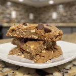 Close-up view of peanut butter protein cookies on a plate.