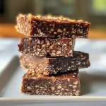 Close-up view of Chocolate Peanut Butter Energy Bars with a textured surface.