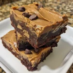 Close-up view of protein-packed peanut butter brownies with a fudgy texture.