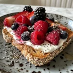 Close-up view of Coconut Yogurt and mixed berries on multigrain toast.