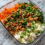 ['Close-up view of Ground Turkey Meal Prep Bowls with vibrant vegetables and rice.', 'Juicy Ground Turkey Meal Prep Bowls featuring colorful ingredients arranged neatly.', 'Side view of a delicious Ground Turkey Meal Prep Bowl filled with ground turkey, veggies, and rice.', 'A vibrant Ground Turkey Meal Prep Bowl showcasing a variety of fresh ingredients.']